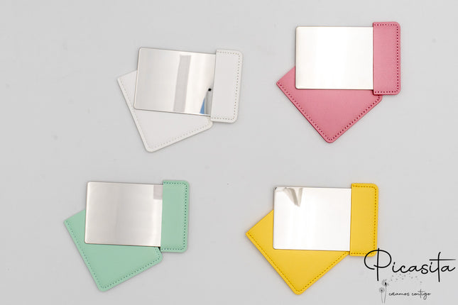 Miroir rectangulaire en acier et cuir synthétique