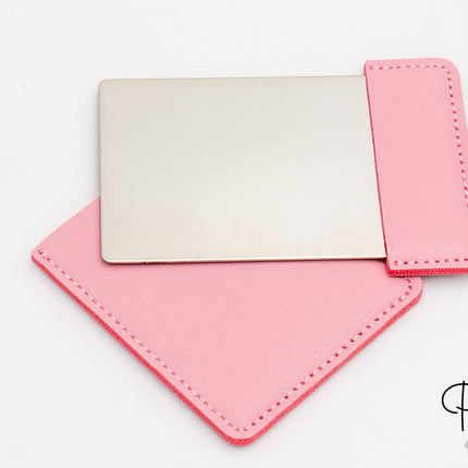 Miroir rectangulaire en acier et cuir synthétique