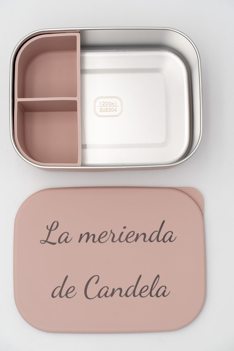Tupper XL rosa abierto con módulo lateral y frase en la tapa