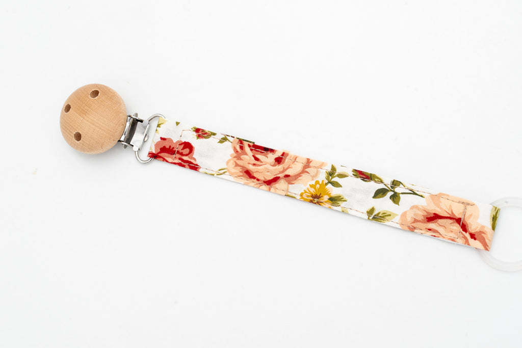 Attache-tétine en tissu imprimé de roses vintage avec clip rond en bois