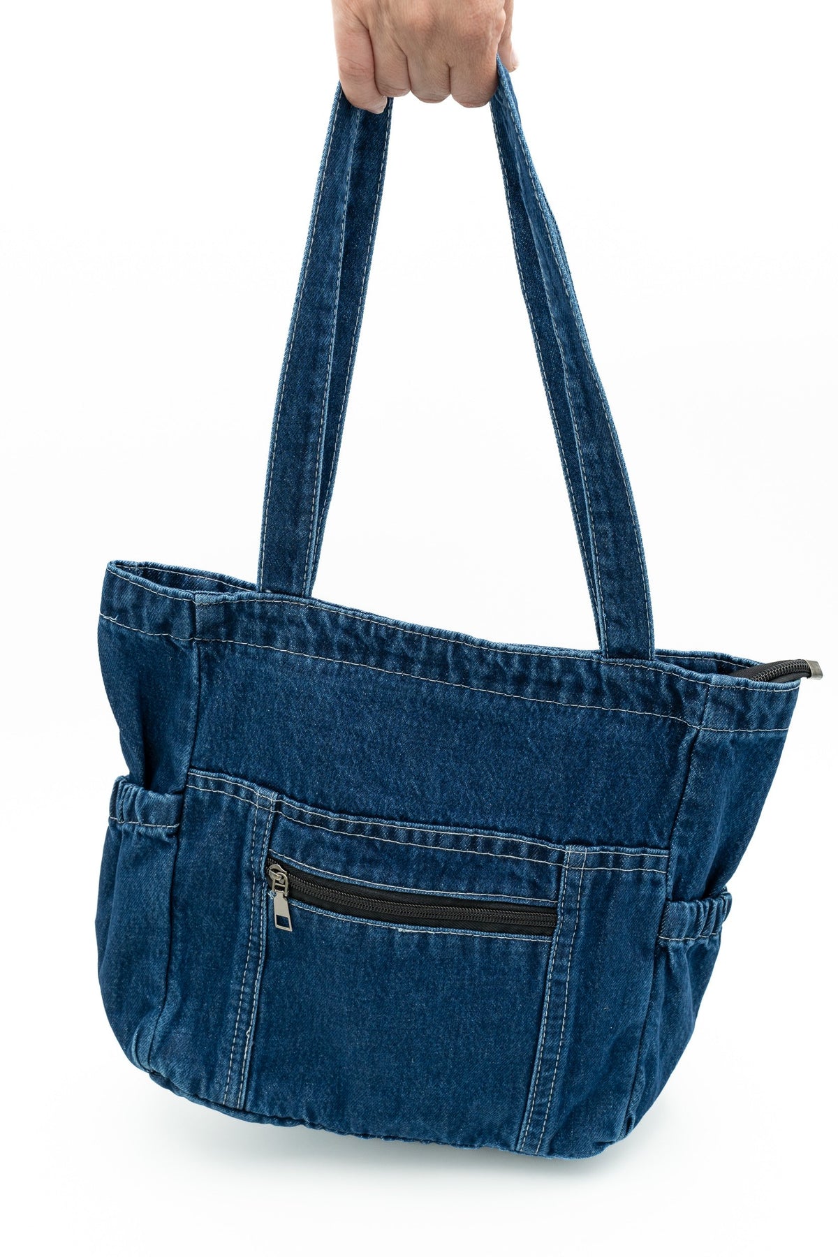 Sac en denim avec poches latérales élastiques et poche avant à fermeture éclair horizontale