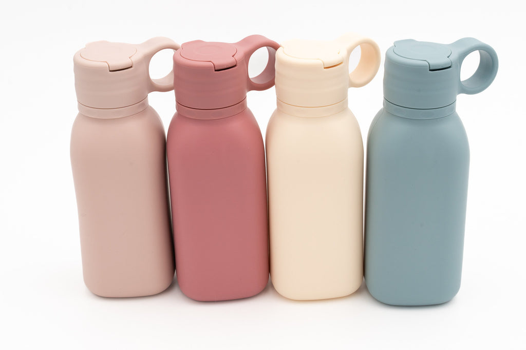 Quatre gourdes en rose, rose foncé, crème et bleu gris