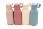 Quatre gourdes en rose, rose foncé, crème et bleu gris