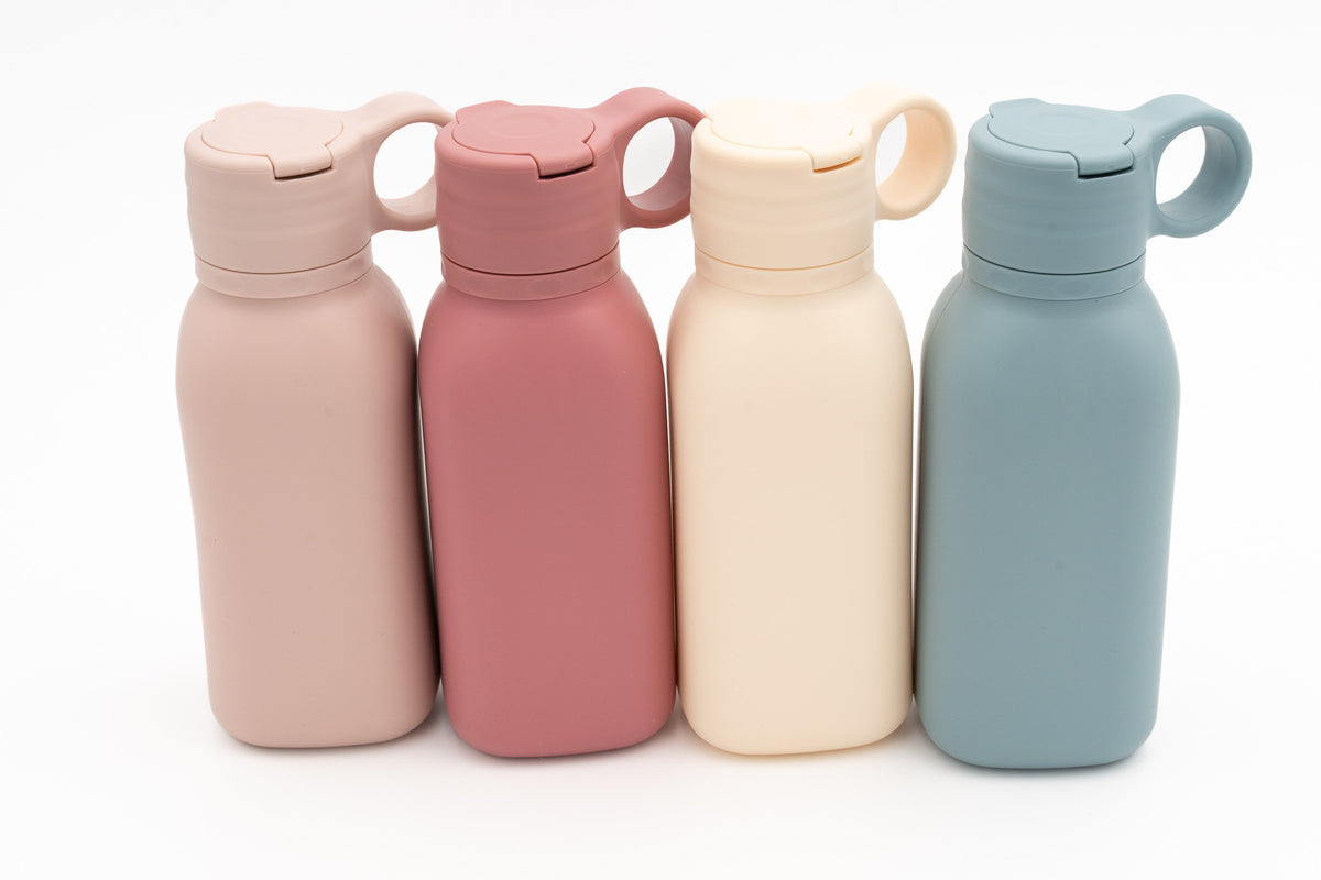 Quatre gourdes en rose, rose foncé, crème et bleu gris