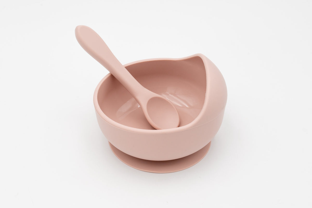 Bol rose clair avec ventouse et cuillère en silicone