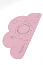 Set de table nuage rose clair souple, partiellement enroulé